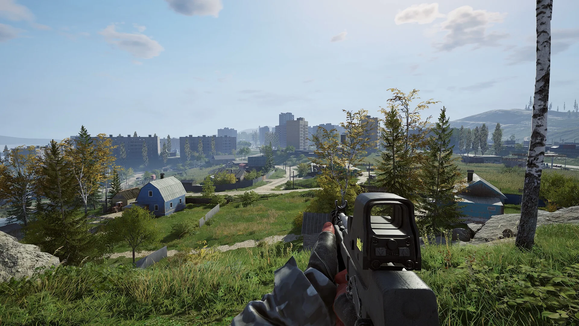 Deadside hillside view over a settlement used for loot and resource radar context